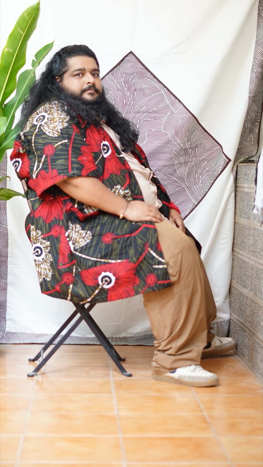 The floral kimono, model seated
