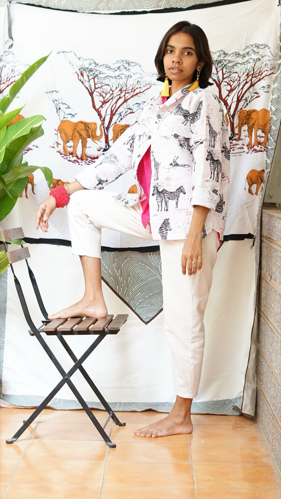 A white shirt printed with zebras